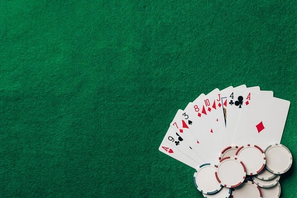 Mobile phone showing live roulette table interface with bet placement buttons